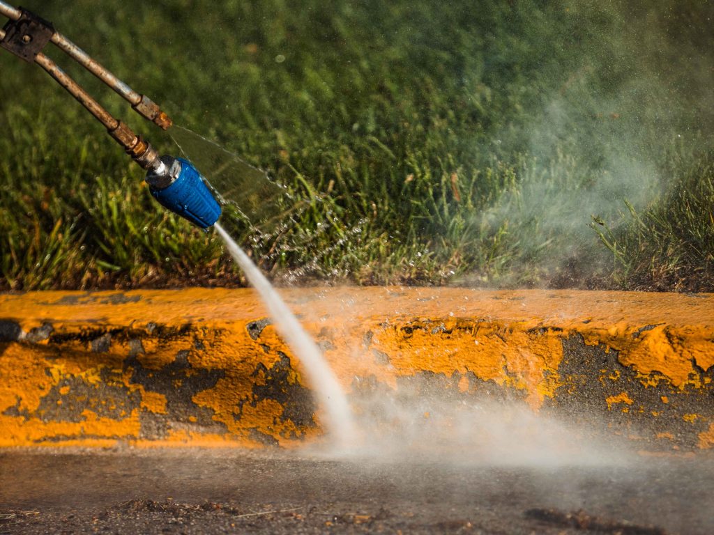 powerwashing a curb